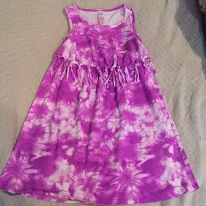 Tie dyed girl’s dress with fringe on bottom of top